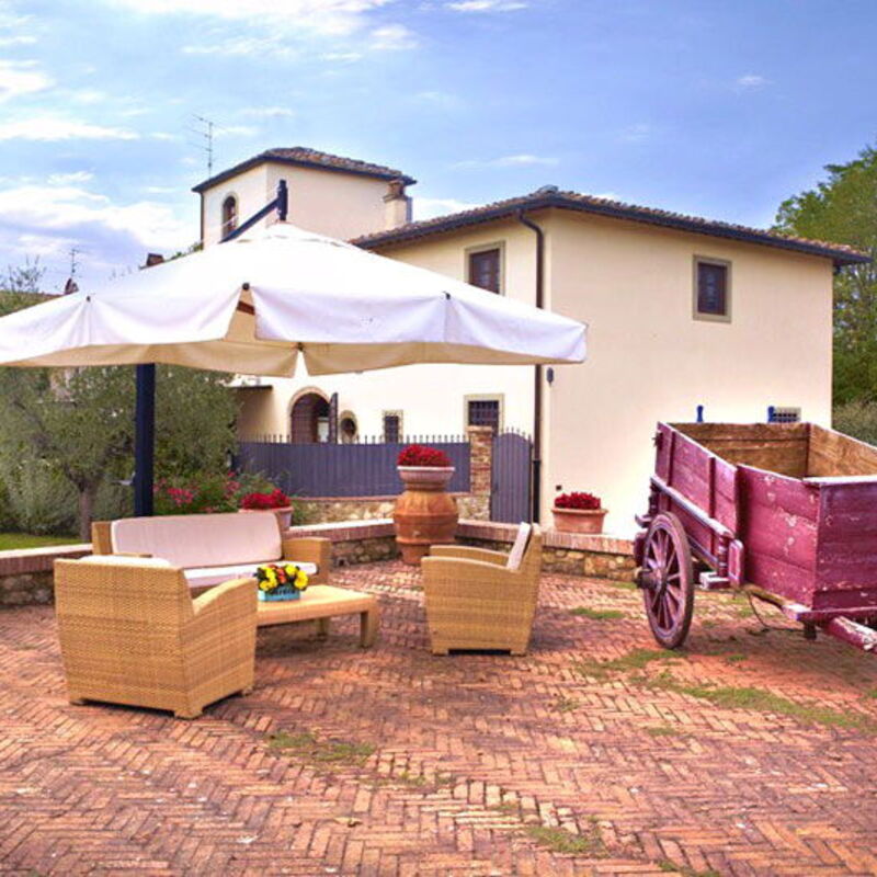 Country Resort Tavarnelle - By Belcantovillas: Cozy equipped garden of the holiday farm in Tuscany.