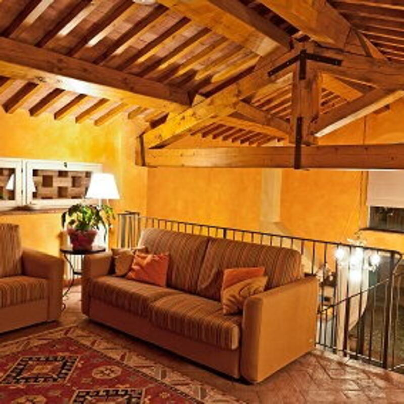 Villa Sunflower - By Belcantovillas: Cosy living room of the villa for rent in Tuscany - Sunbathing