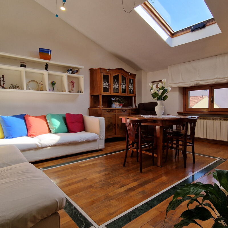 Foscolo Steps To The Sea: Stylish living room with wooden and marble floor. A wonderful part of an apartment in the center of Viareggio just 50 meters from the sea